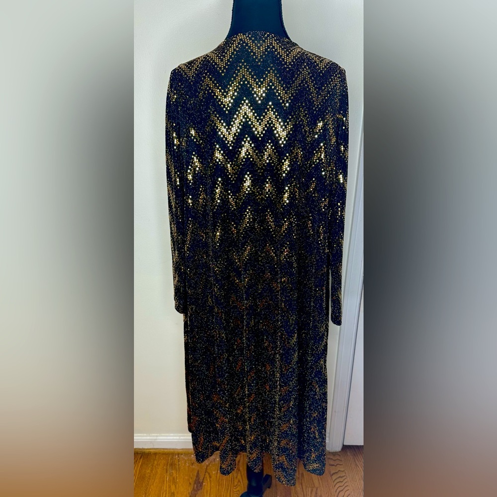 LuLaRoe black and gold sparkle”Sarah” sweater size S.